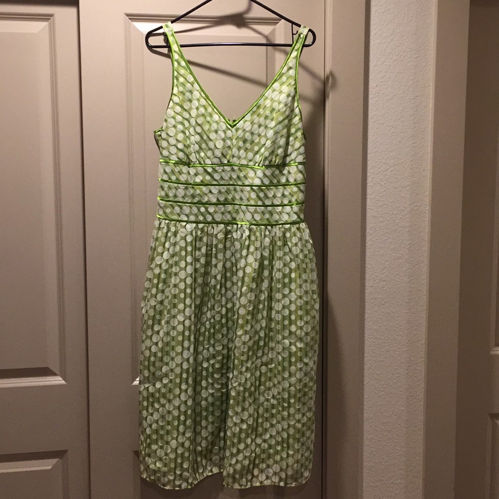 Lime green and polka dot dress.